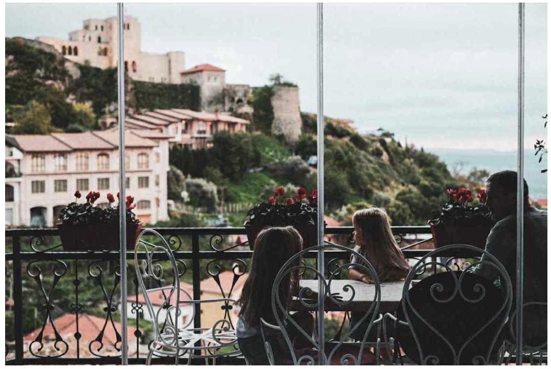 Family enjoying the terrace view